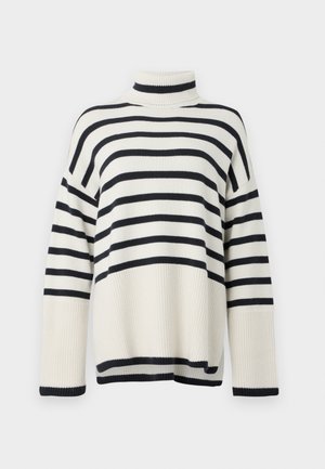 Pruščen turtleneck pulover z rebrasto teksturo, ki se ponaša z izmeničnimi širokimi črtami v mornarsko modri in kremni barvi. Ohlapen kroj in padli ramenski dizajn.