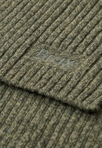 Khaki uldsør med ribbet tekstur og foldet manchet. Har diskret broderet branding i en matchende farve.