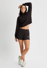 Röhnisch SOFT - Pantalón corto de deporte - obsidian black