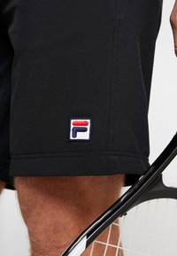 Fila SHORTS SANTANA - Spordišortsid - black