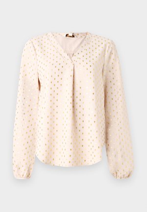 Blusa de manga longa, cor-de-rosa claro, com decote em V, apresentando padrões quadrados dourados. Textura suave com punhos franzidos e um caimento descontraído.