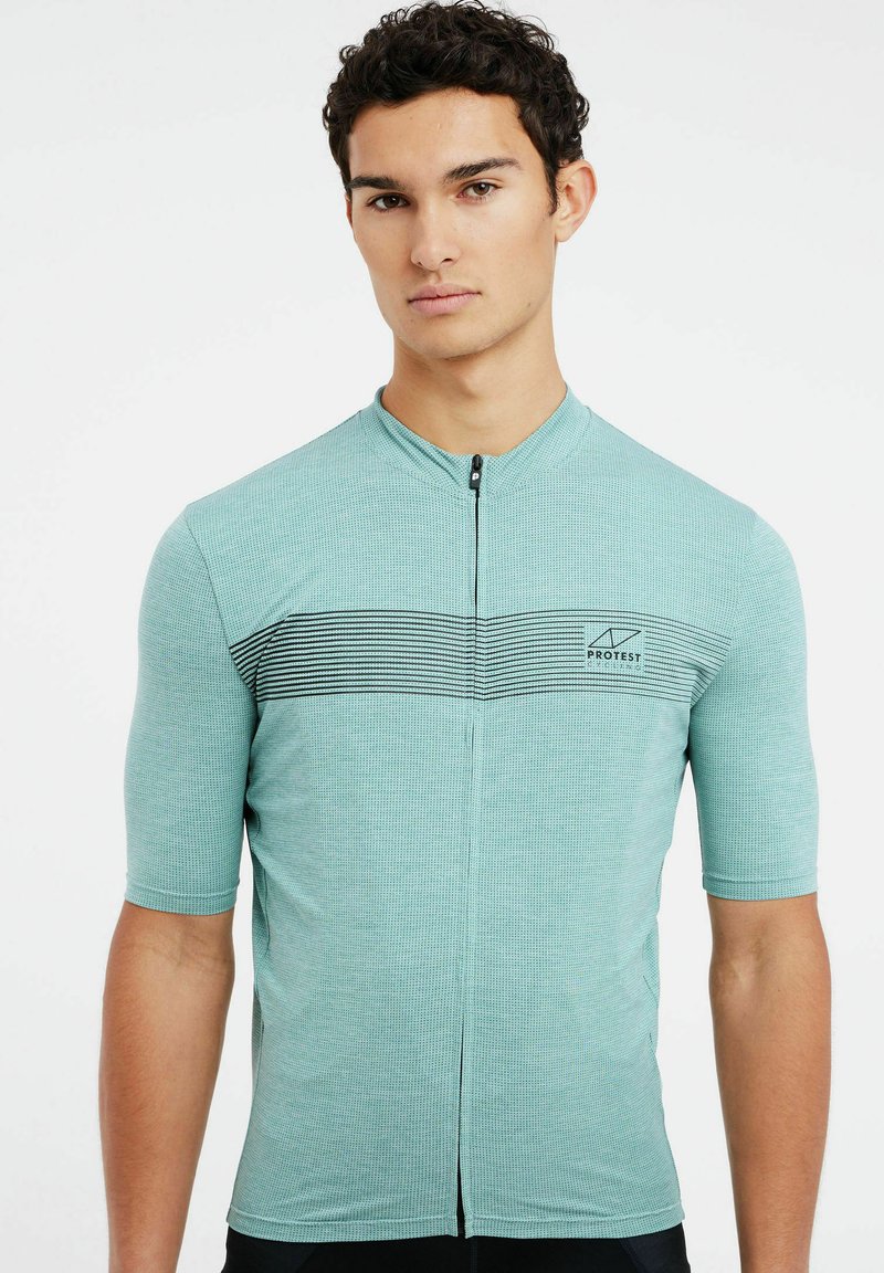 Maillot de cyclisme à manches courtes en vert menthe, avec un motif texturé, des rayures horizontales noires et une fermeture éclair à l'avant. Logo sur la poitrine gauche.