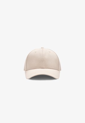 Beige baseball sapka, strukturált koronával és ívelt napellenzővel. Textúrált anyagból készült, varrási részletekkel és állítható pánttal.