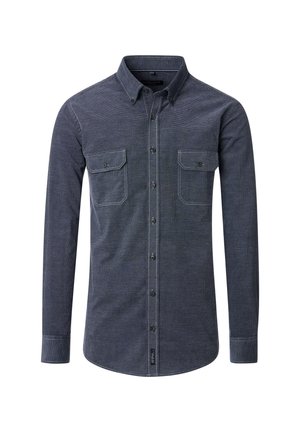 Chemise à manches longues bleu marine avec un col à boutons, deux poches poitrine, des coutures contrastantes et un ourlet incurvé. Tissu en mélange de coton.