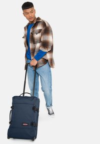 Eastpak TRANVERZ S x WHERE'S WALLY - Wheeled suitcase - frozen navy