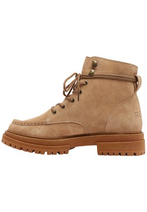Tan suede ankle boots with a rounded toe, lace-up front, and tan rubber sole. Features include two metal eyelets and stitched detailing.