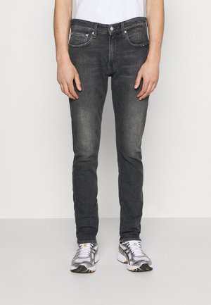 Jeans Tapered Fit - black denim