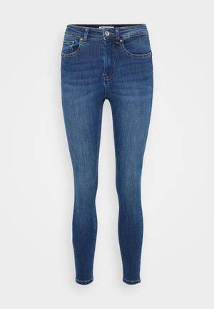 Tynne jeans i mørkeblå denim, med et klassisk fem-lommers design, synlig søm og glidelås med knappelukking.