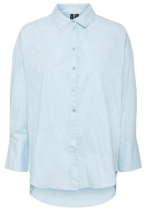 Light blue button-up shirt with a collar, long sleeves, and a curved hem. The fabric appears smooth with subtle texture and buttons matching the color.