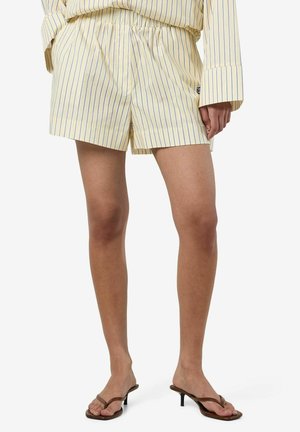 Pantaloni corti a righe gialle realizzati in tessuto leggero, con una vita elasticizzata, vestibilità sagomata e piccolo logo sul lato.