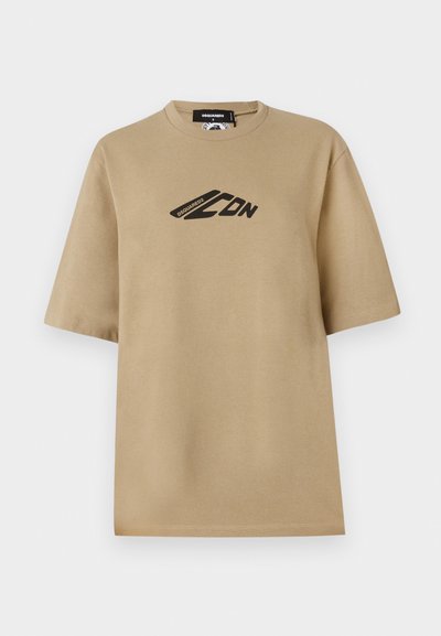 Beige katoenen T-shirt met korte mouwen, voorzien van een zwart grafisch logo op de voorkant. Klassiek crew neck ontwerp en een ontspannen pasvorm.
