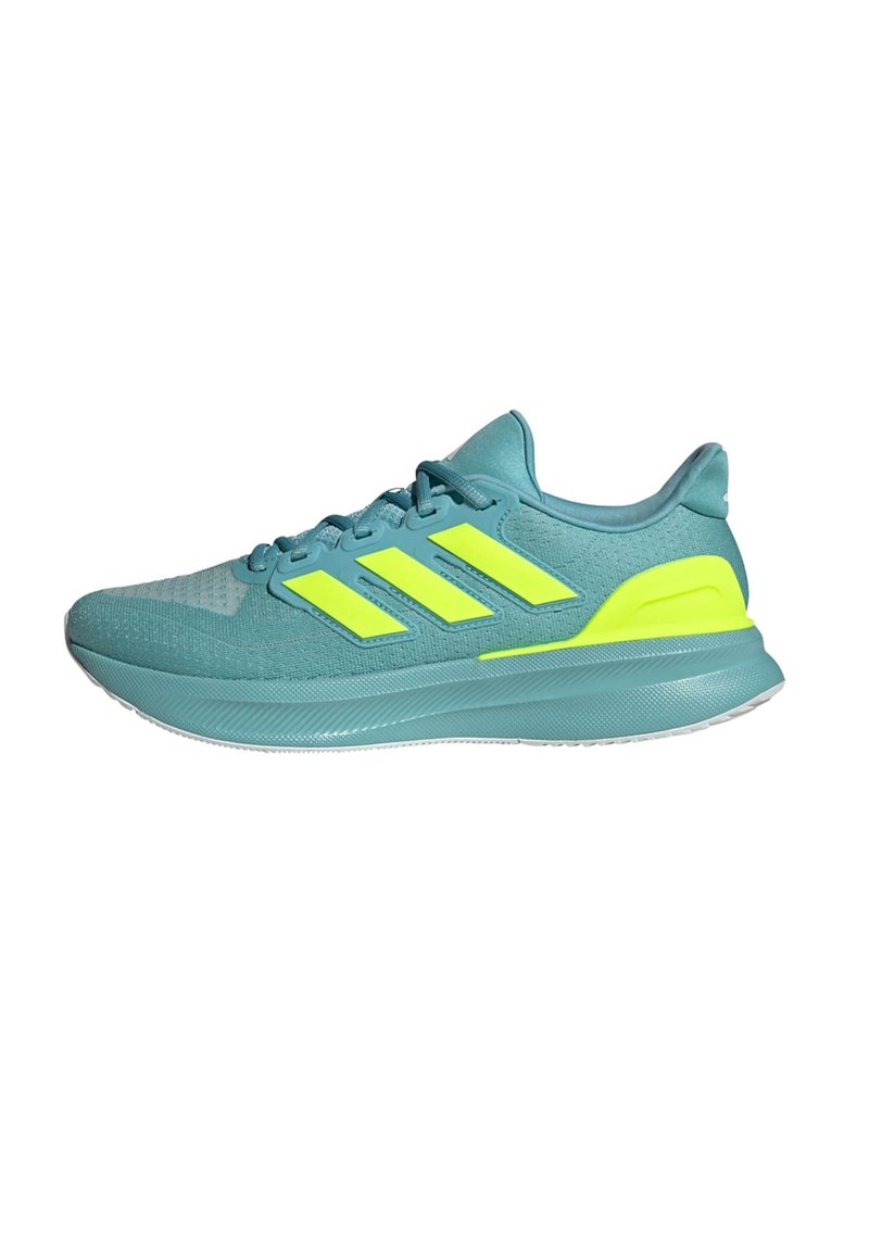 Zapatos deportivos de color azul claro con parte superior de malla, tres franjas amarillas, suela texturizada y collar acolchado para mayor comodidad.