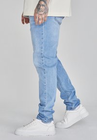 SIKSILK DROP CROTCH - Jeans Tapered Fit - light blue