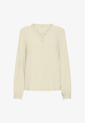 Kreemikarva pikkade varrukatega pluus V-kaelusega, ühe nupu kinnitusega ja kergelt kogutud varrukate otstega.