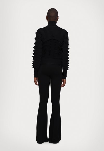 Stieglitz STIEG FLARED - Legging (type pantalon) - black