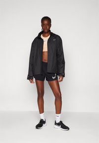 Nike Performance FAST - Windbreaker - black
