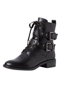 Botín negro hasta el tobillo con acabado de cuero suave, que presenta cordones, múltiples correas con hebillas y acentos de tachuelas. Diseño de tacón bloque bajo.