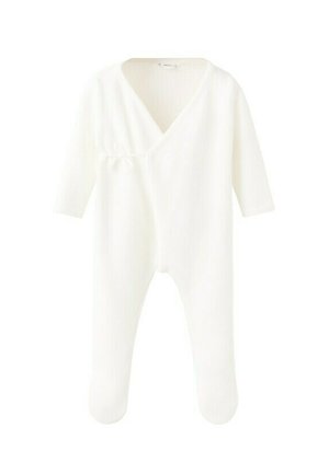 Body blanc à manches longues pour bébé avec jambes couvertes et fermeture latérale à nouer, en tissu tricoté doux.