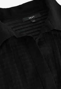 Next COVER-UP - Rannatarvikud - black
