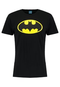 Juodas medvilninis marškinėliai su dideliu geltonu Batman logotipu priekyje. Trumpomis rankovėmis su klasikiniu apvaliu kaklu.