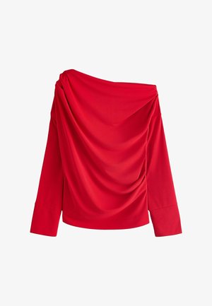 Červený top bez ramienok s dlhými rukávmi. Má záhyb s látkou cez prednú časť a hladkú textúru. Jednoduchý, elegantný dizajn.