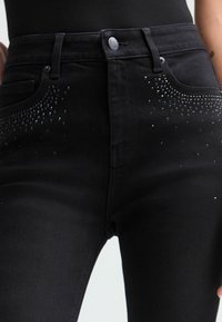 Next EMBELLISHED SUPERSOFT PETITE 
 - Trapezaste traperice - black