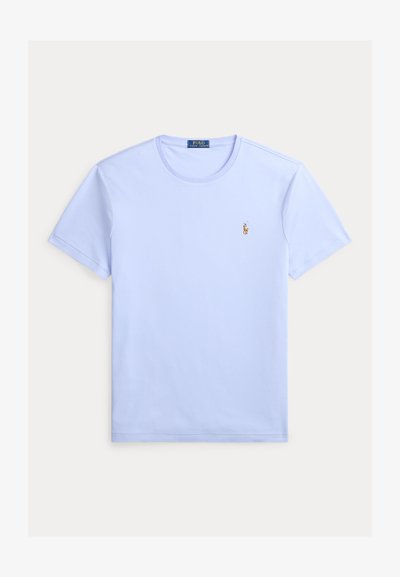 T-shirt bleu clair à manches courtes et col rond avec un petit logo Polo Ralph Lauren brodé sur la poitrine gauche.