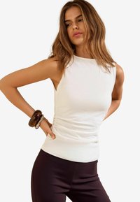 Selected, ivory