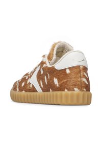 Brown and white spotted sneakers with faux fur upper, white leather accents, and rubber sole. Features soft texture and rounded shape.