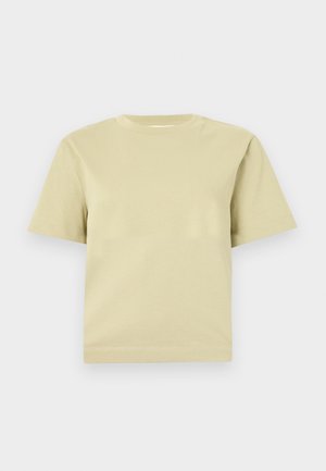 T-shirt à manches courtes de couleur jaune clair, en coton doux. Il présente un col rond et une coupe décontractée, sans motifs ni ornements.