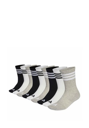 Negen paar enkellange sokken in zwart, wit en grijs, elk met twee horizontale strepen bij de boord en een logo op de voet.