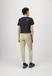 The North Face PANT - Treniņtērpa apakšdaļas - granite sand/kelp tan