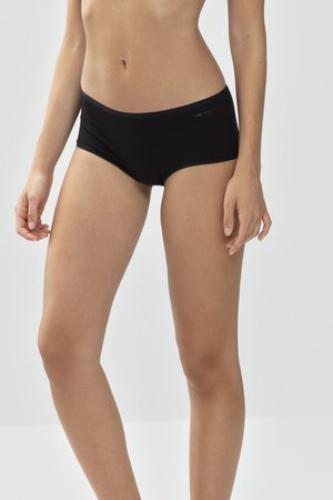 Slips in cotone nero con una texture liscia, cintura larga e senza cuciture visibili, progettati per il comfort e una vestibilità a vita bassa.