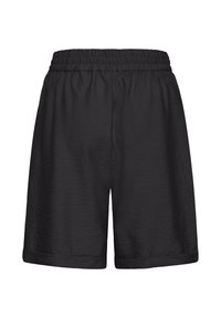 Short noir à taille élastique avec une coupe ample et une légère texture, montré de face sur fond blanc.