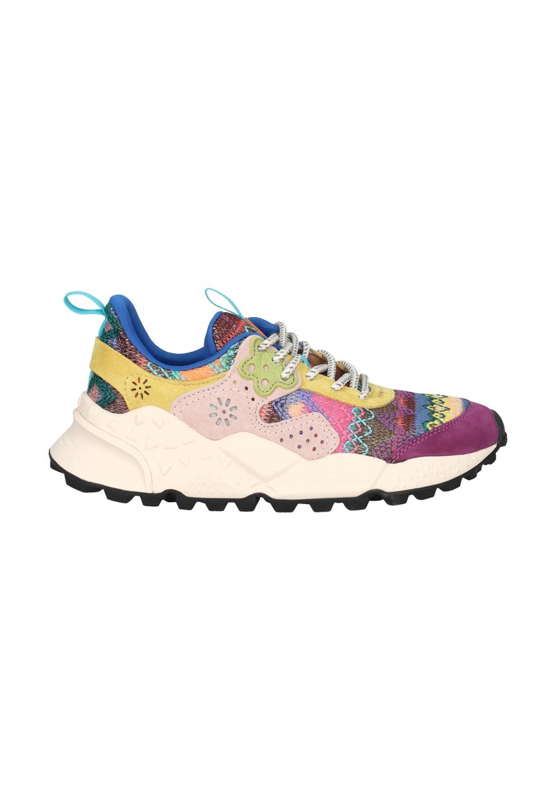 Multicolored sneaker with a textured upper combining fabric and suede in shades of pink, yellow, purple, and blue. Chunky black sole.