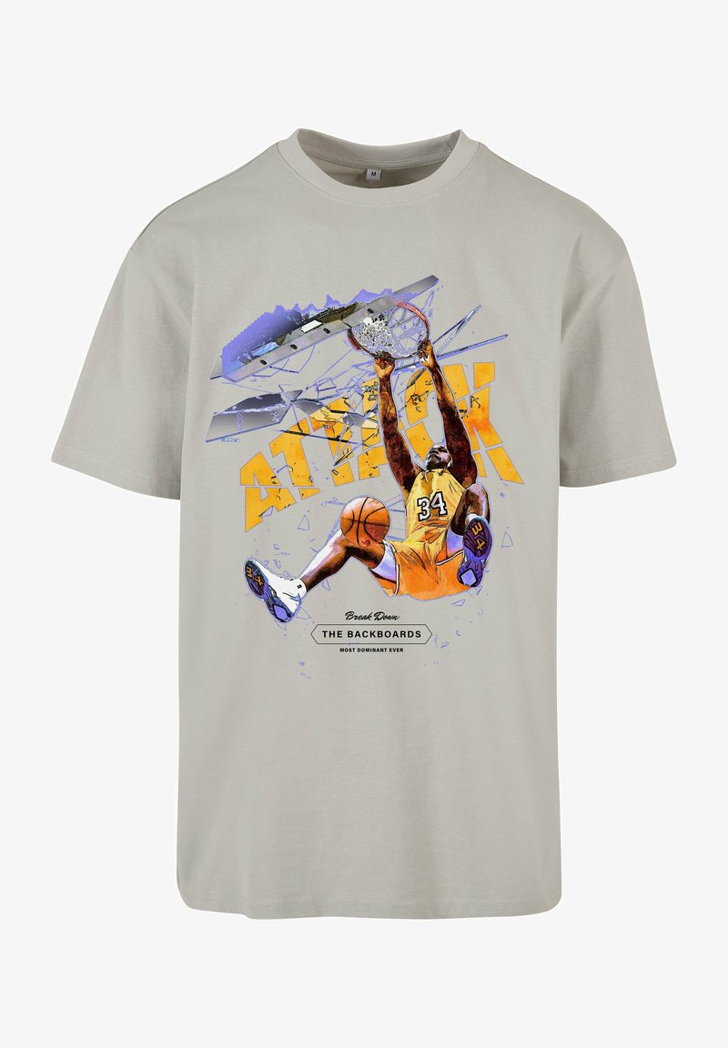 T-shirt en coton gris avec un graphisme de basketball représentant un joueur en maillot jaune, accents bleus, et le texte "Casser LES TABLEAUX."