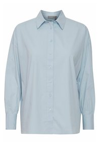 Light blue shirt with a classic collar, button placket, and long puff sleeves. Made from smooth fabric with a slightly relaxed fit.
