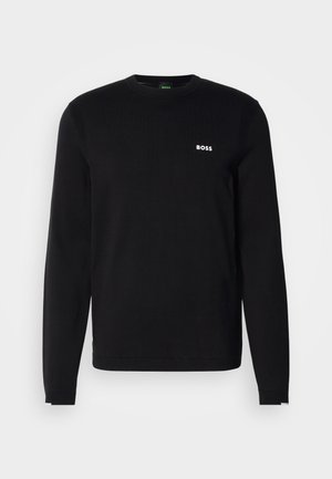 Pulôver preto de manga longa em design canelado, com decote redondo e um logótipo "BOSS" branco no peito. Tecido de malha macia.