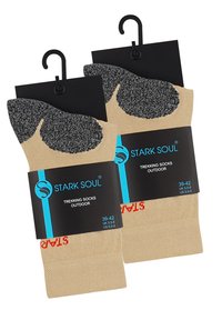 Chaussettes de randonnée beige avec des chevilles rembourrées grises, emballées avec des étiquettes noires. Taille 39-42, avec un tissu texturé et le nom de la marque affiché en évidence.