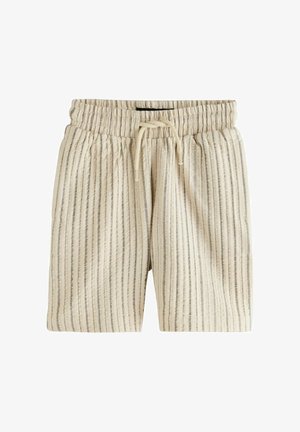 Bézs rövidnadrág függőleges fekete csíkokkal, rugalmas derékrésszel és elöl húzózsinórral az állítható illeszkedésért.