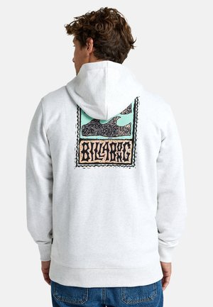 Gray hoodie featuring a graphic print on the back with waves and “Billabong” text. Ribbed cuffs and waistband for texture. Cotton material.