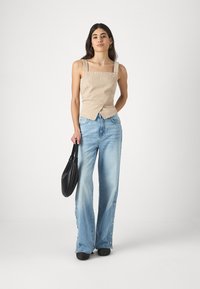 Guess Pernera ancha - daydreamz