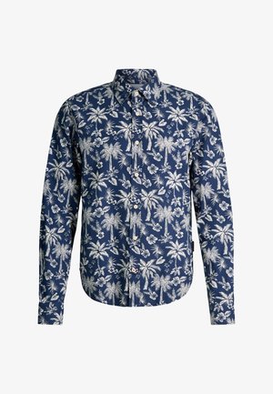 Camicia blu navy a maniche lunghe con bottoni, decorata con motivo di palme tropicali e fiori bianchi.