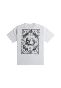 White cotton t-shirt featuring a black graphic print with a skull and female figure, ornate border, and animal motifs. Short sleeves and crew neck.