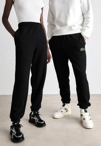 Lacoste - XH - Tracksuit bottoms - noir Thumbnail Image 1
