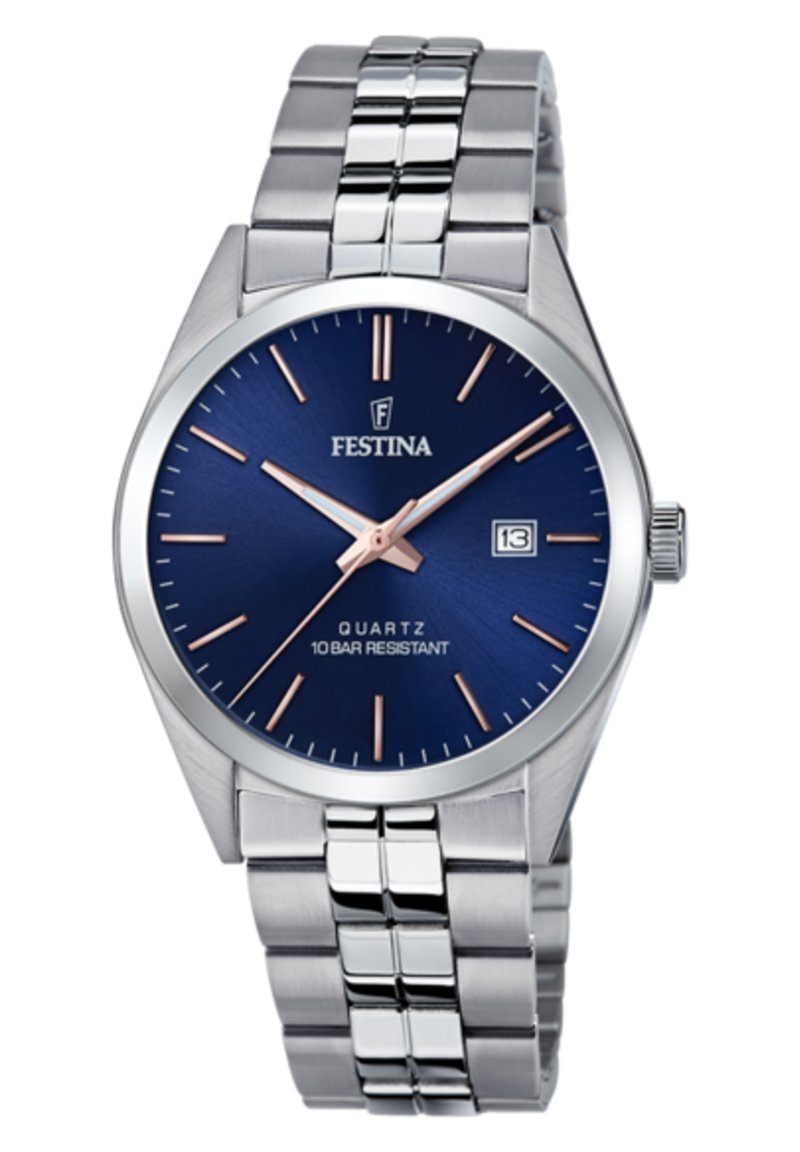Montre en quartz argentée avec un cadran bleu, des accents en or rose, un affichage de la date et un bracelet en acier inoxydable. Étanche jusqu'à 10 bars.