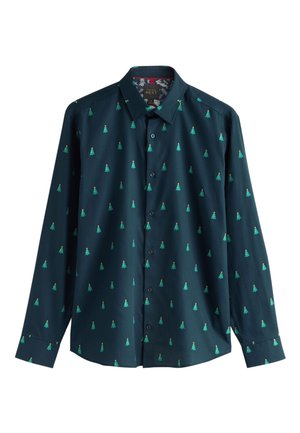 Mörkt teal långärmad skjorta med ett geometriskt mönster av små gröna träd. Slät tyg med en strukturerad krage och knappstängning.