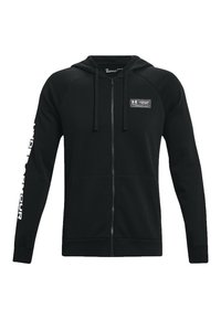 Felpa nera con zip e cappuccio, realizzata in tessuto morbido. Presenta un patch con logo sul petto, cordini e accenti di testo bianco su una manica.