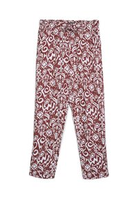 Pantaloni larghi a fantasia marrone e bianco con vita elastica e cintura annodata, distesi su uno sfondo bianco.