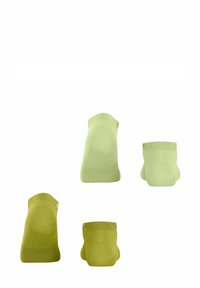 Zielone skarpetki w różnych odcieniach, z prążkowaną fakturą i elastycznymi ściągaczami. Wyeksponowane w różnych pozycjach i orientacjach.